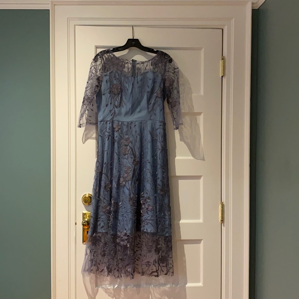 Periwinkle blue lace cocktail dress. NWT Beautiful lace detail.